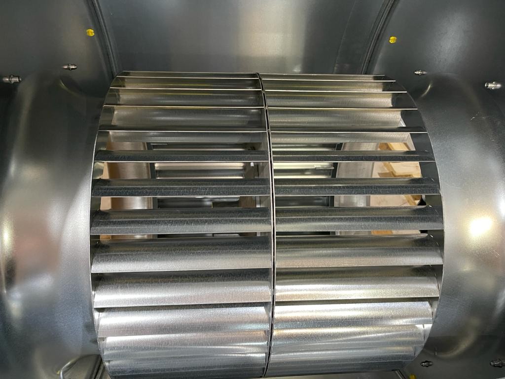 Double inlet centrifugal fans with forward curved blades.